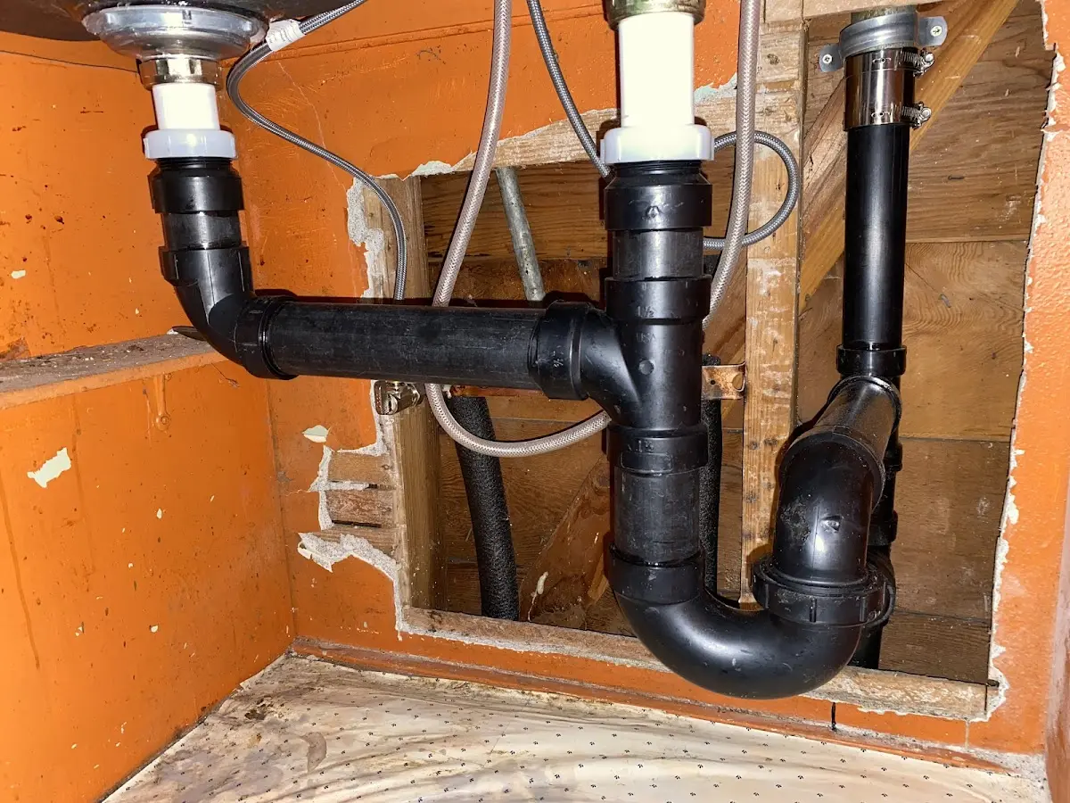 Professional Garbage Disposal Repair equipment and tools on the job in Renton